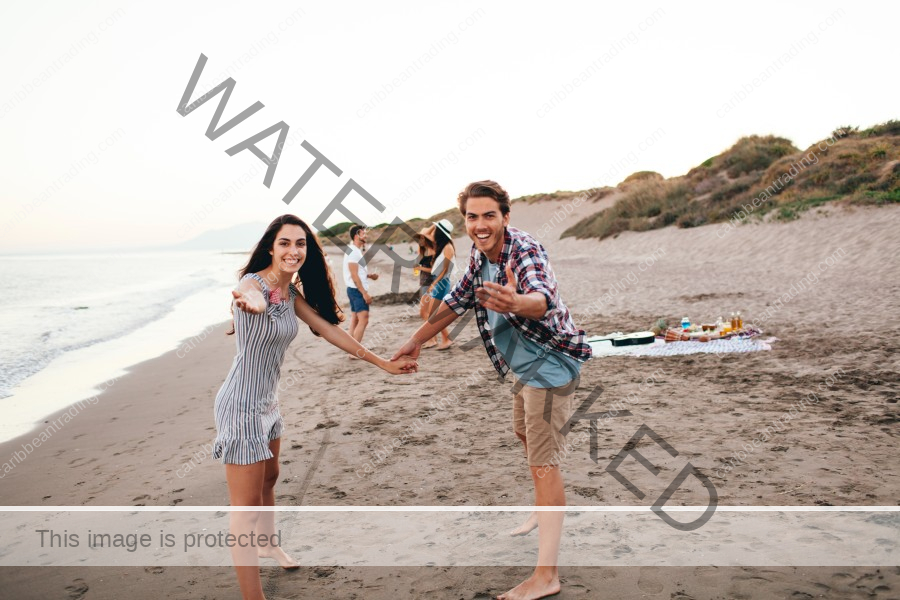 young-friends-having-good-time-beach